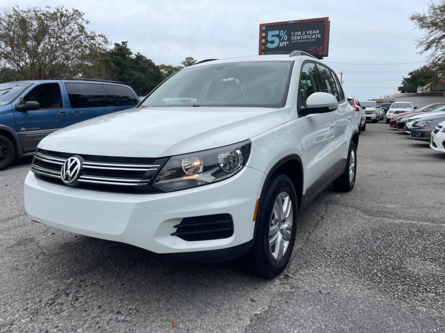 2017 WHITE VOLKSWAGEN TIGUAN S (WVGAV7AX7HK) with an 2.0L engine, Automatic transmission, located at 5103 Dorchester Rd., Charleston, SC, 29418-5607, (843) 767-1122, 36.245171, -115.228050 - Clean Interior with Leather, CD/AUX/USB/Bluetooth, Power Everything (windows, locks, seat, mirrors), Heated Seats, All-weather Mats, Push Button Start, Keyless Entry, Alloy Wheels. Clean CarFax (no accidents reported!) Local Trade-in!! 99k miles Located at New Life Auto Sales! 2023 WINNER for Pos - Photo#2